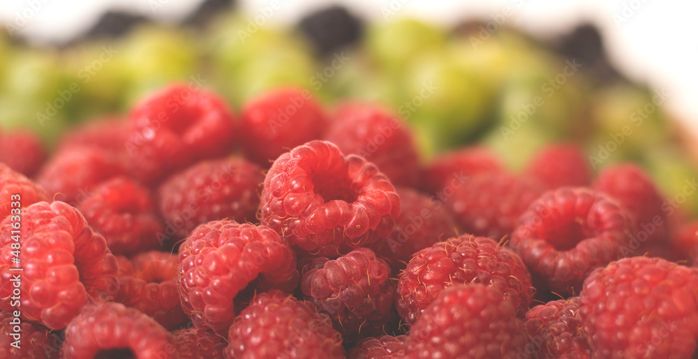 Summer fruity berry background. Table with berries and fruits. Summer breakfast, vacation, morning, sun. Berries, raspberries, blackberries, gooseberries. Vase with berries and fruits. Summer fruity berry background. Table with berries and fruits. Summer breakfast, vacation, morning, sun. Berries, raspberries, blackberries, gooseberries. Vase with berries and fruits.