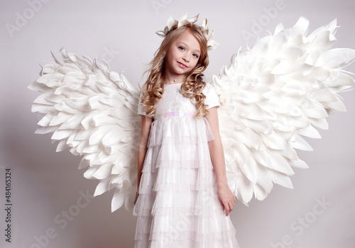 Pretty young lady with angel wings