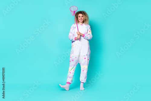 Full size photo of impressed young lady with net wear kigurumi socks isolated on blue background