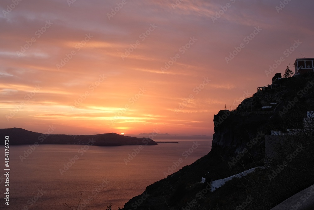 View of a beautiful orange sunset in Fira Santorini Greece
