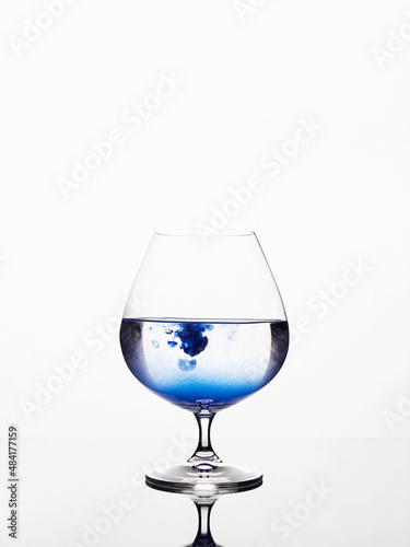 blue liquor in glass. beautiful still life