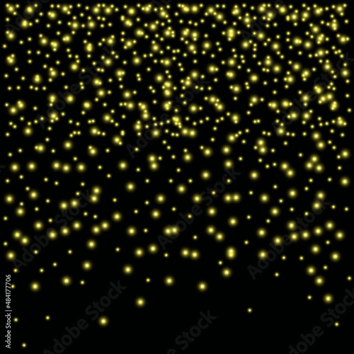 Gold sequins on a black background