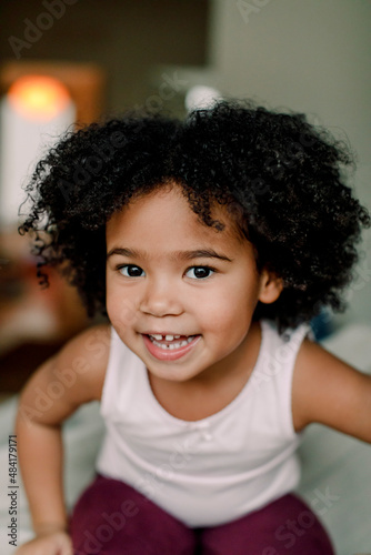 Wallpaper Mural Portrait of smiling girl at home Torontodigital.ca