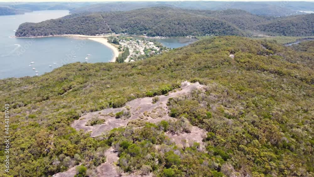 Aerial drone pan shot of Elephant Rock formation Patonga Beach Bay National Park Bushland tourism Central Coast NSW Australia 4K Aerial drone pan shot of Elephant Rock formation Patonga Beach Bay National Park Bushland tourism Central Coast NSW Australia 4K