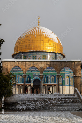 dome of the rock with snow in jerusalem