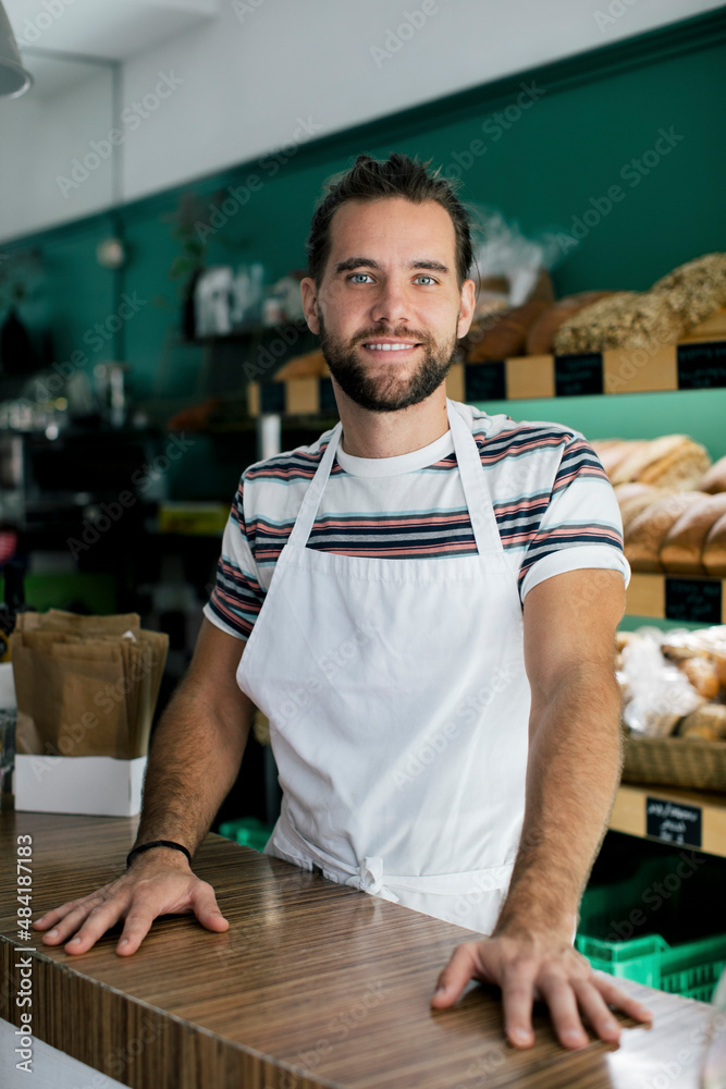 Portrait of smiling male entrepreneur in bakery Portrait of smiling male entrepreneur in bakery