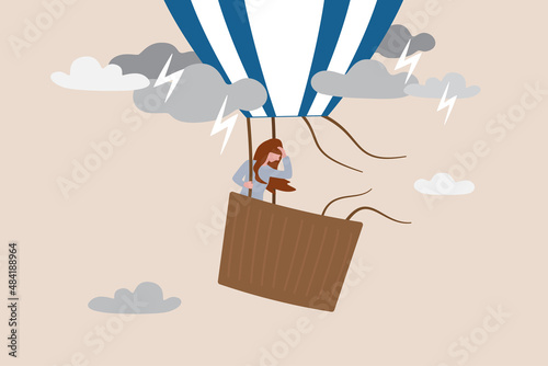 Mental health, depression or sadness, anxiety and stressed problem, work difficulty and obstacle, pessimism concept, depressed desperate and hopeless woman in falling down air balloon in thunder storm