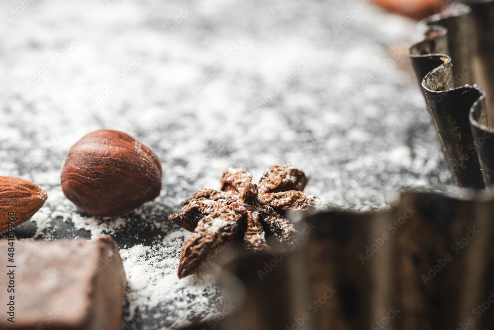 Baking concept, focus on a star anise, close-up view Baking concept, focus on a star anise, close-up view