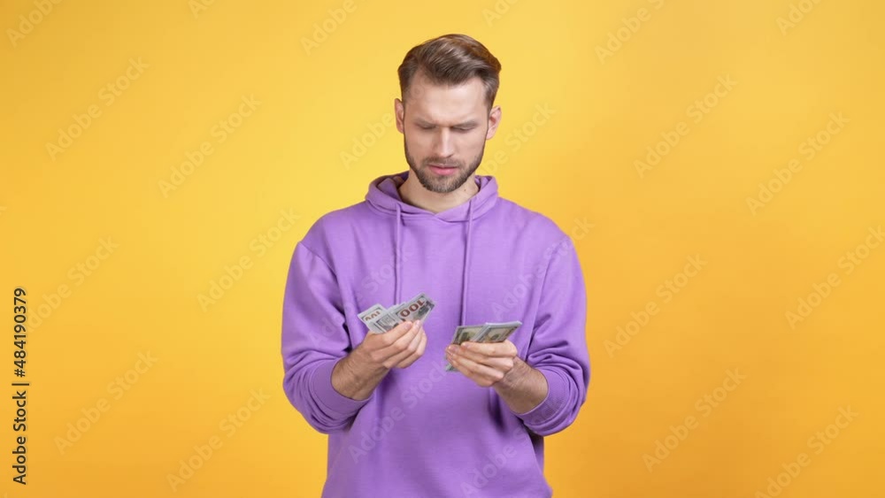 Guy get profit wrong money number isolated vibrant color background Guy get profit wrong money number isolated vibrant color background