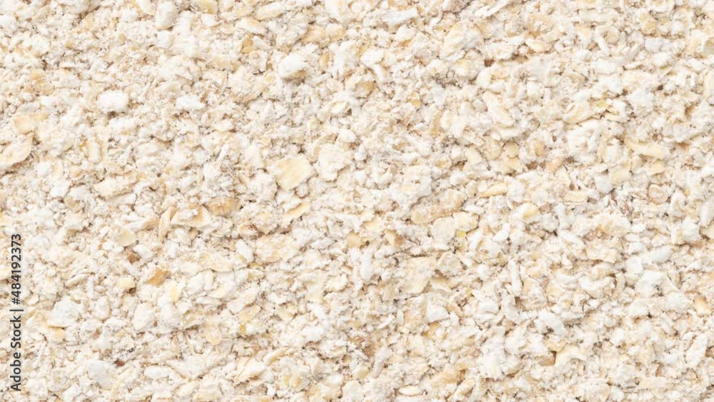 Closeup, top view of oat bran. Food backdrop Closeup, top view of oat bran. Food backdrop