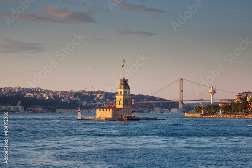 Istanbul in the evening. View of the Bosphorus, the Maiden's Tower and the bridge. Travel to Istanbul, Turkey. © Dmitriy