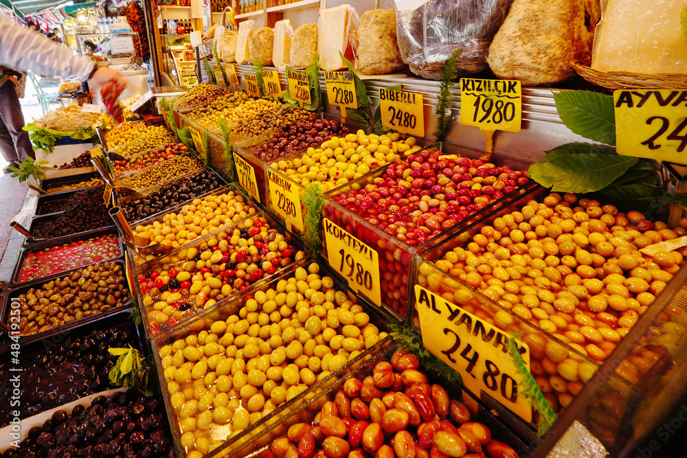 Olives of different varieties and sizes are sold at a market in Istanbul, Turkey.