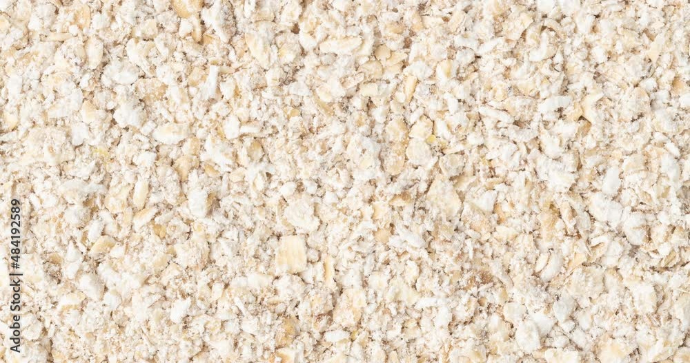 Closeup, top view of oat bran. Food backdrop Closeup, top view of oat bran. Food backdrop