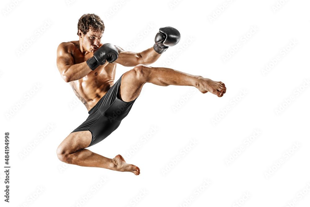 Full size of athlete kickboxer who perform muay thai martial arts on white background. Sport concept