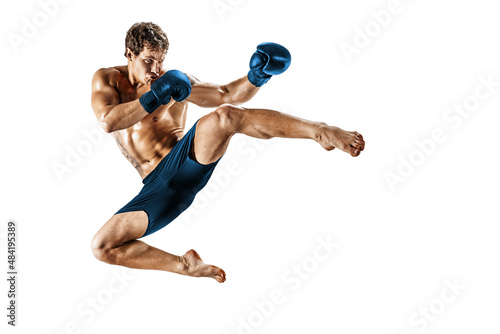 Full size of kickboxer who perform muay thai martial arts on white background. Blue sportswear 