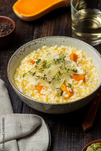 Risotto with pumpkin, cheese and thyme. Vegetarian food. Healthy eating.