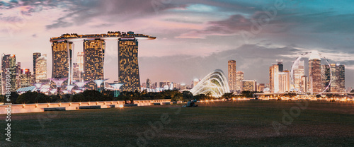 SSINGAPORE, SINGAPORE - MARCH 2019: Vibrant Singapore skyline at night photo