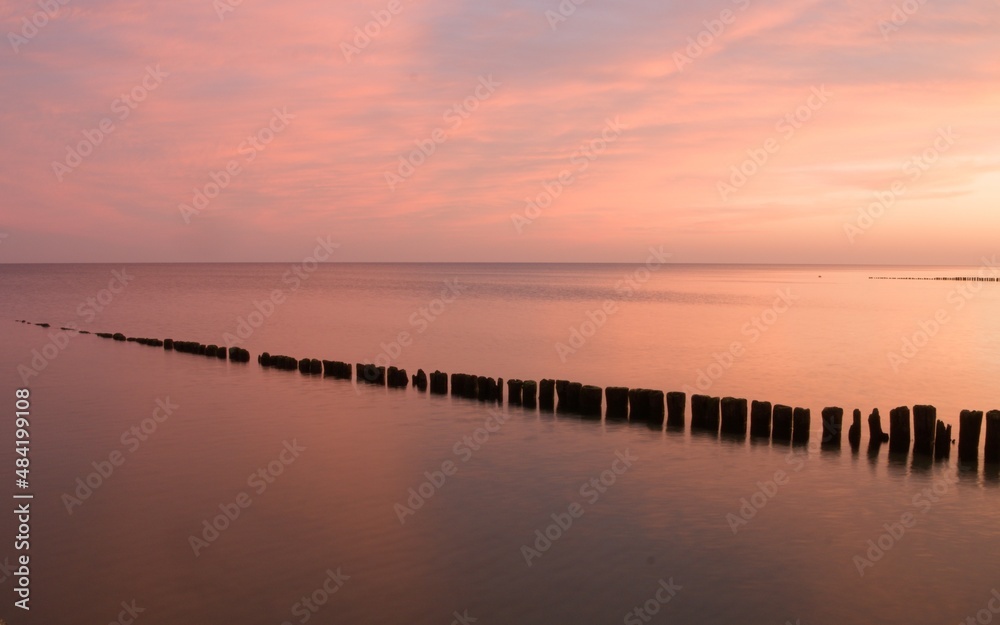 Sunset over the Baltic Sea in Kołobrzeg.