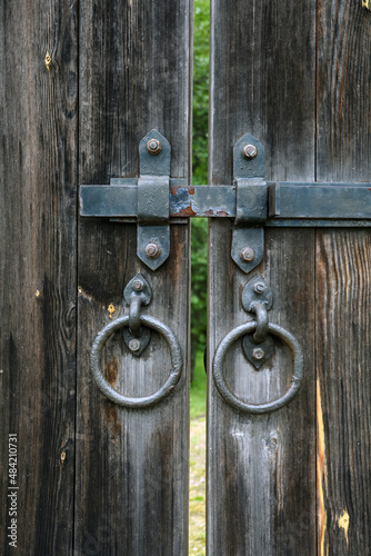 Old wooden door with lock © Ekaterina Bykova