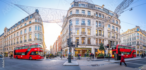 View of red buses on Regent Street at Christmas, London, England