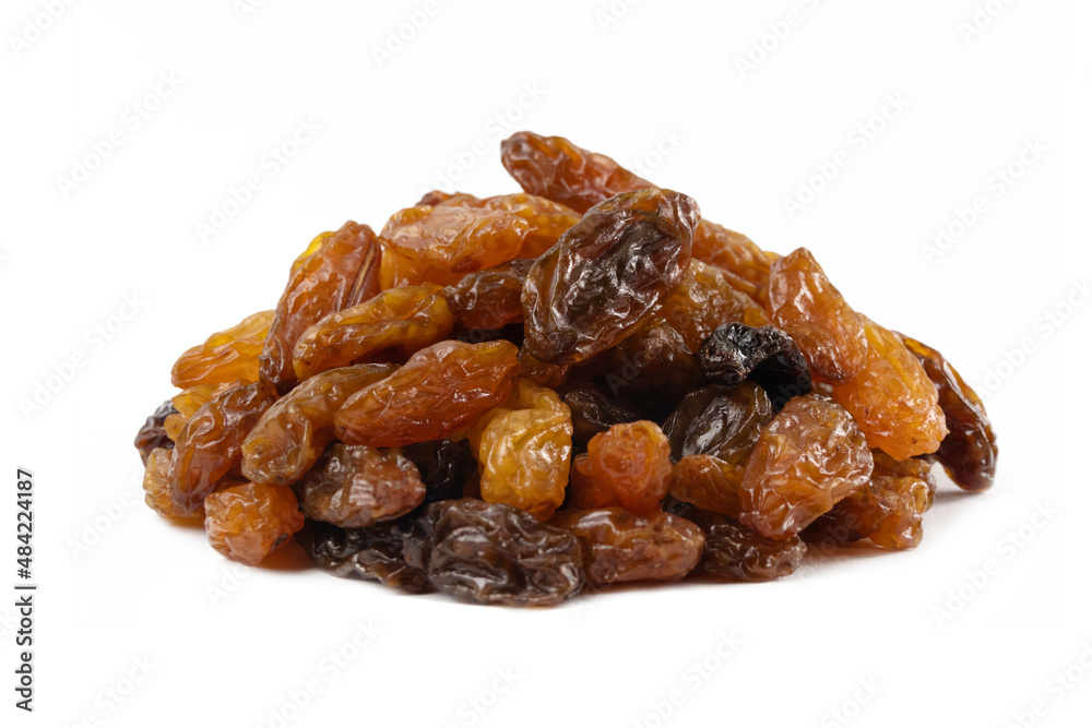 royal raisins heap isolated on white background.Spice and food ingredients.
