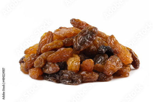 royal raisins heap isolated on white background.Spice and food ingredients.