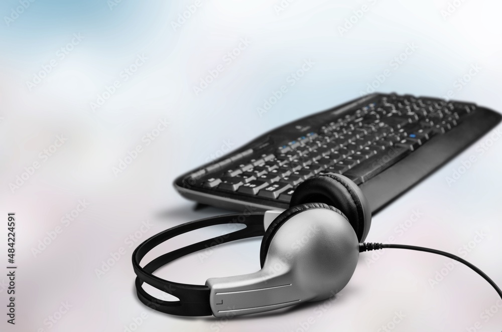 Headset and customer support equipment at call center ready for actively service. Corporate business help Headset and customer support equipment at call center ready for actively service. Corporate business help