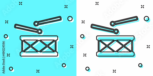 Black line Drum with drum sticks icon isolated on green and white background. Music sign. Musical instrument symbol. Random dynamic shapes. Vector