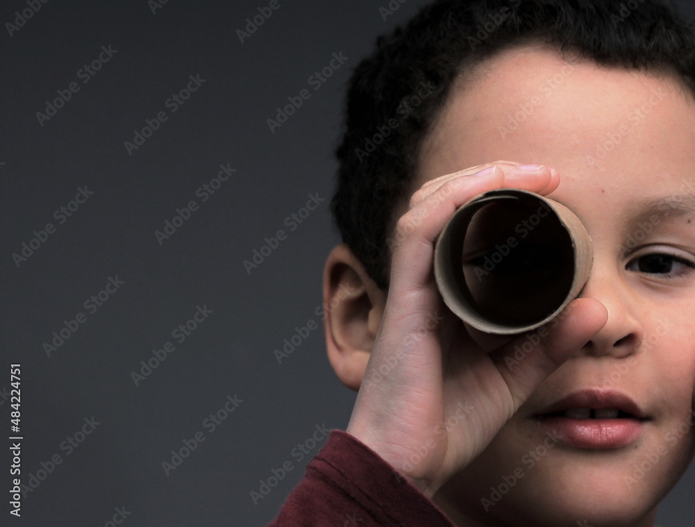 boy looking through binoculars toilet paper roll stock photo boy looking through binoculars toilet paper roll stock photo