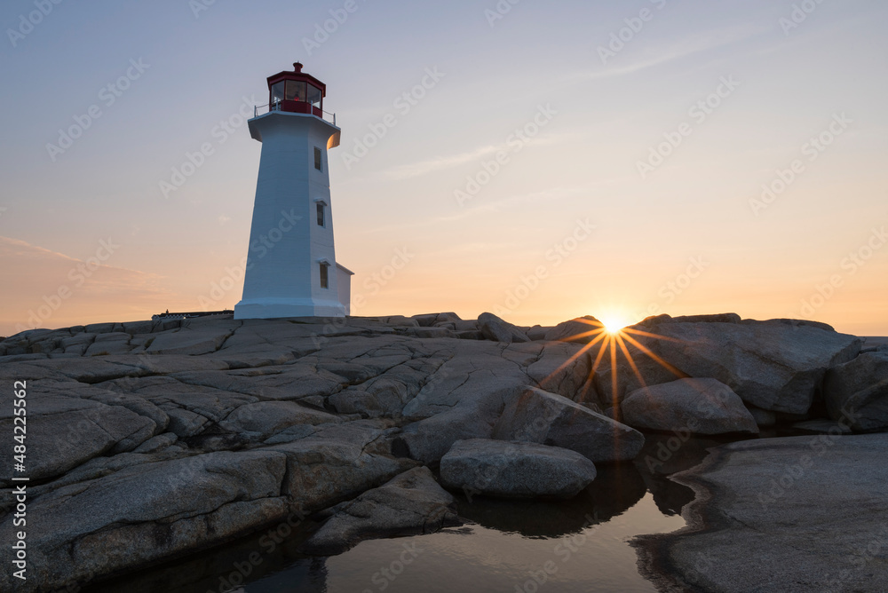 Lighthouse in Peggy's Cove at sunrise, Nova Scotia Lighthouse in Peggy's Cove at sunrise, Nova Scotia