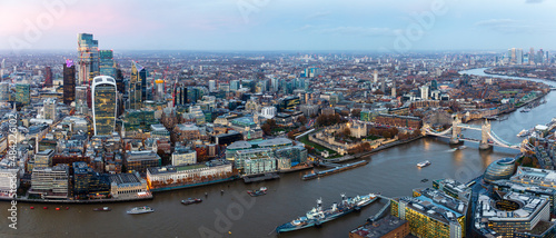 Panorama of City of London skyline and River Thames from above, including Tower Bridge, London, England photo