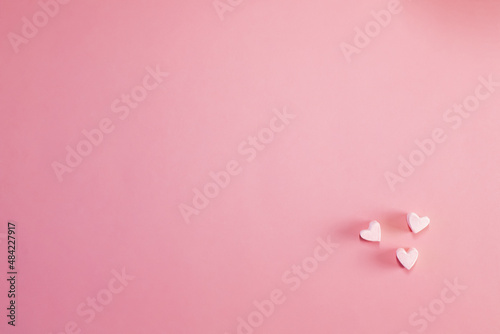 Heart made of marshmallows on a pink background. Happy Valentine's Day, Mother's Day, 8 March, World Women's Day. Copy space. The concept of holidays and love. Flatlay. Top view.