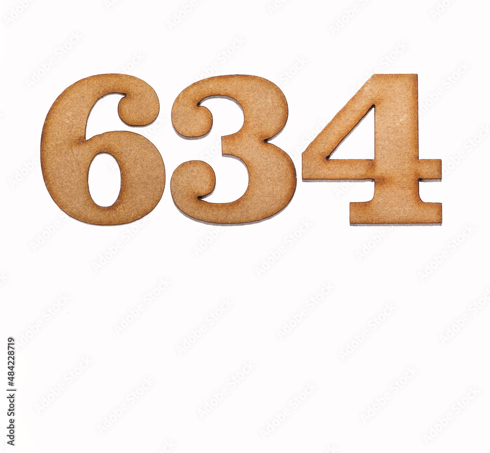 Number 634 in wood, isolated on white background Number 634 in wood, isolated on white background