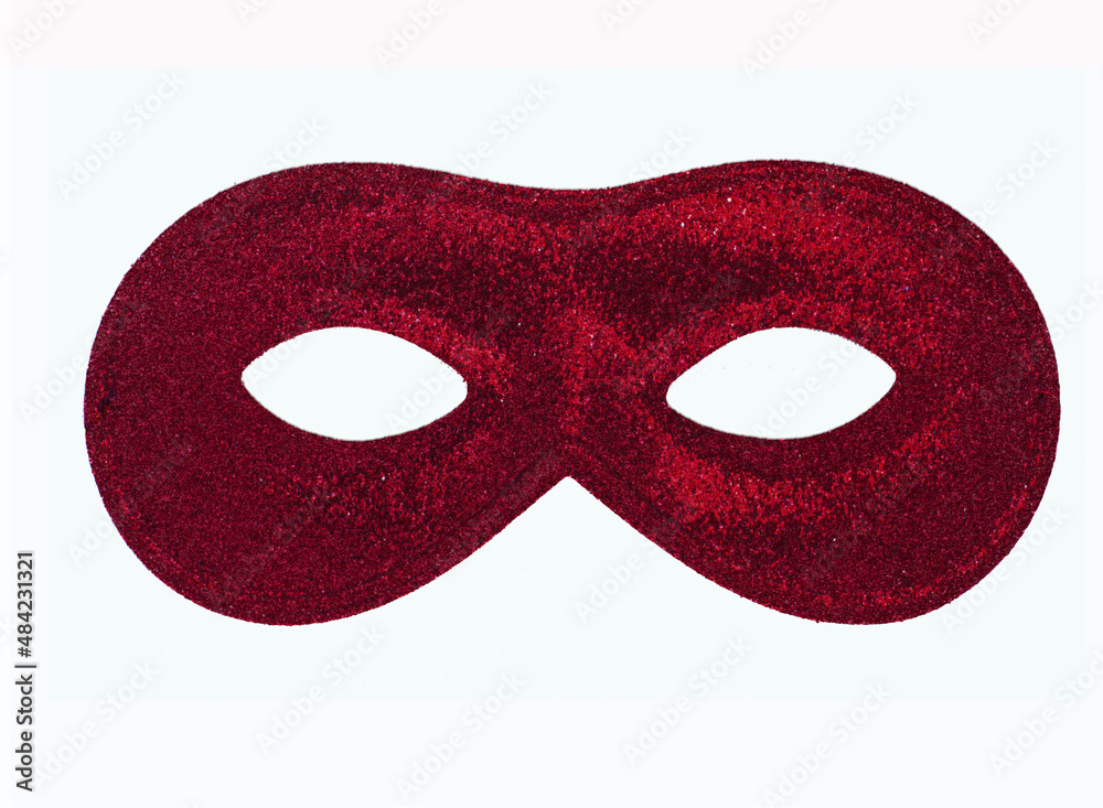 Sexy red carnival mask made of shiny fabric with glitter isolated on white background. Luxury object. Sexy red carnival mask made of shiny fabric with glitter isolated on white background. Luxury object.