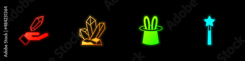 Set Magic stone, Magician hat and rabbit ears and wand icon. Vector