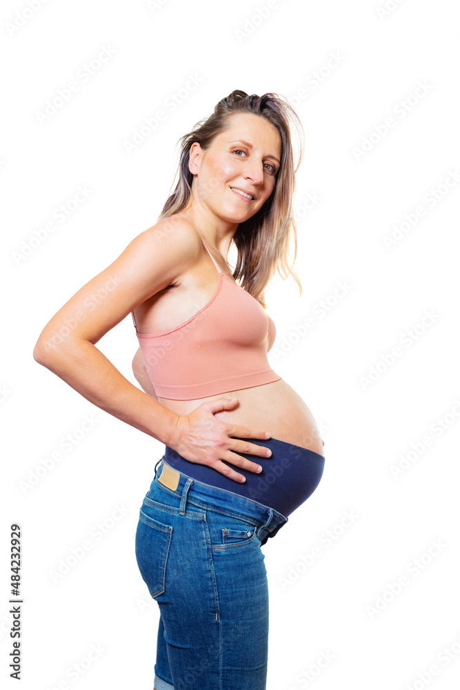 Pregnant woman smiling holing big belly over whtie Pregnant woman smiling holing big belly over whtie