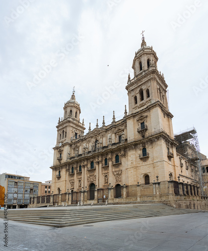 Fototapeta Naklejka Na Ścianę i Meble -  View at the Jaén Cathedral front facade, grand baroque-Renaissance cathedral housing the noted Santo Rostro relic and religious art museum on Plaza Santa Maria, Jaén downtown, Spain