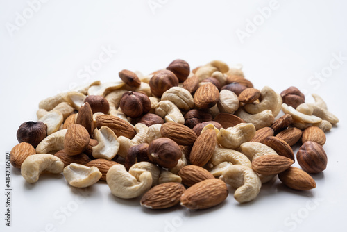 Various nuts on a white background close-up.
