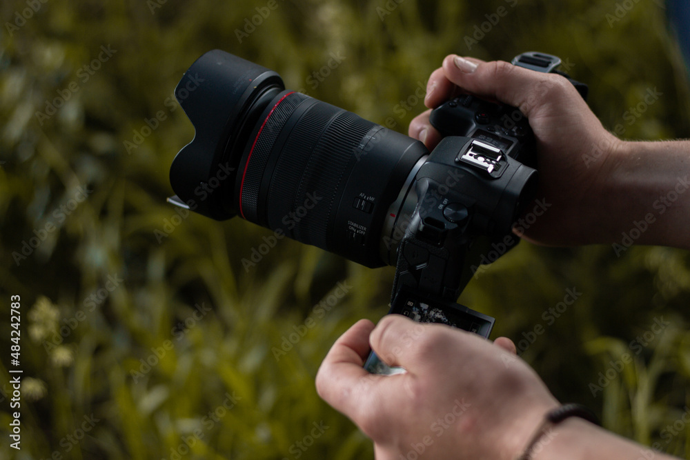 Fototapeta premium Mirrorless camera and lens being used