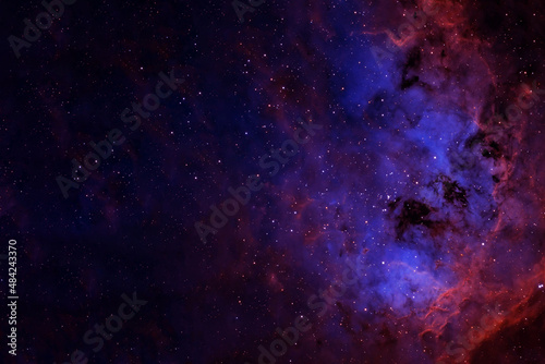 Blue space nebula with stars. Elements of this image furnished by NASA © Artsiom P