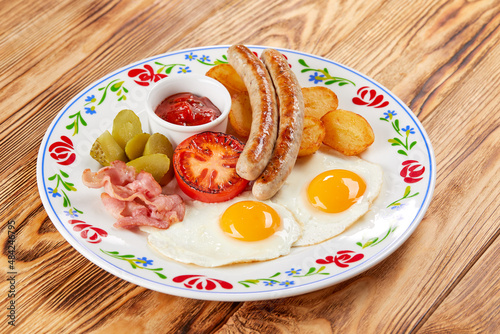 English breakfast with fried eggs