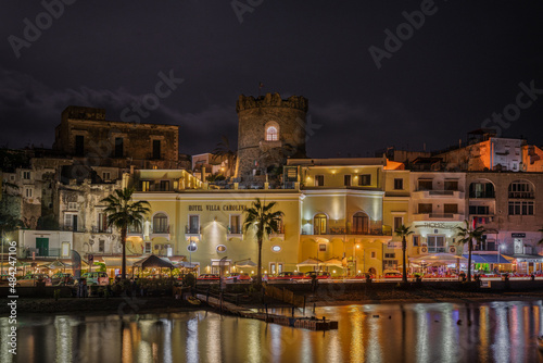 Night view of Forio marina in Ischia, a pretty fishing village full of bars and restaurants, Italy photo