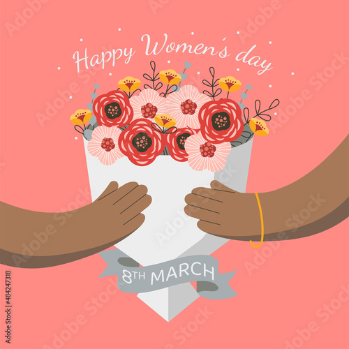 a bouquet of flowers for the holiday women's day dark skinned hands