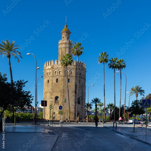 The golden tower in the Centre of Seville alongside the river. The golden tower as it was named, is a popular spot to start a walk on the boulevard