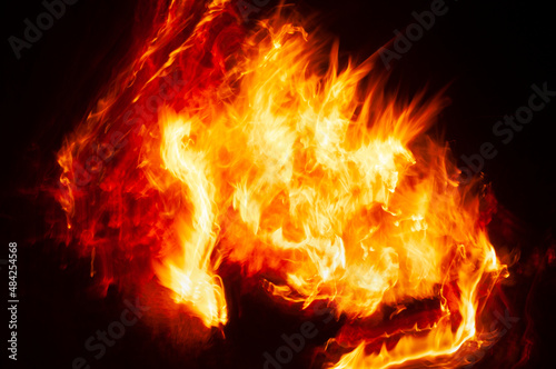 Flames of fire from a bonfire, with abstract shapes and in movement