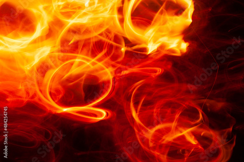 Flames of fire from a bonfire  with abstract shapes and in movement