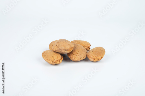 Almond nuts isolated on a white background, close up. Delicious almonds.
