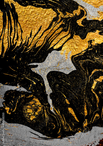 Golden swirl, artistic design. Suminagashi – the ancient art of Japanese marbling. Paper marbling is a method of aqueous surface design. Black and gold paper texture.