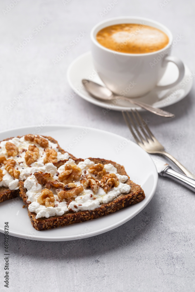 Sandwich with philadelphia and walnuts. Healthy nutritious paleo keto breakfast concept. Sandwich with philadelphia and walnuts. Healthy nutritious paleo keto breakfast concept.
