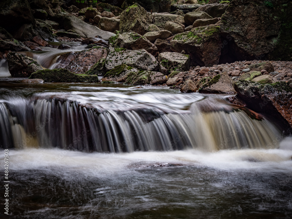 Fototapeta premium Waterfall on river Ilse in forest Harz, Germany